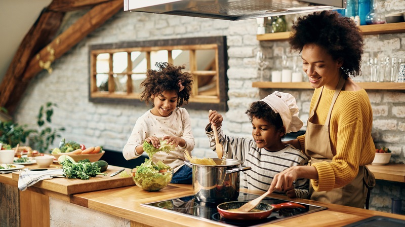 mother, son, daughter cooking